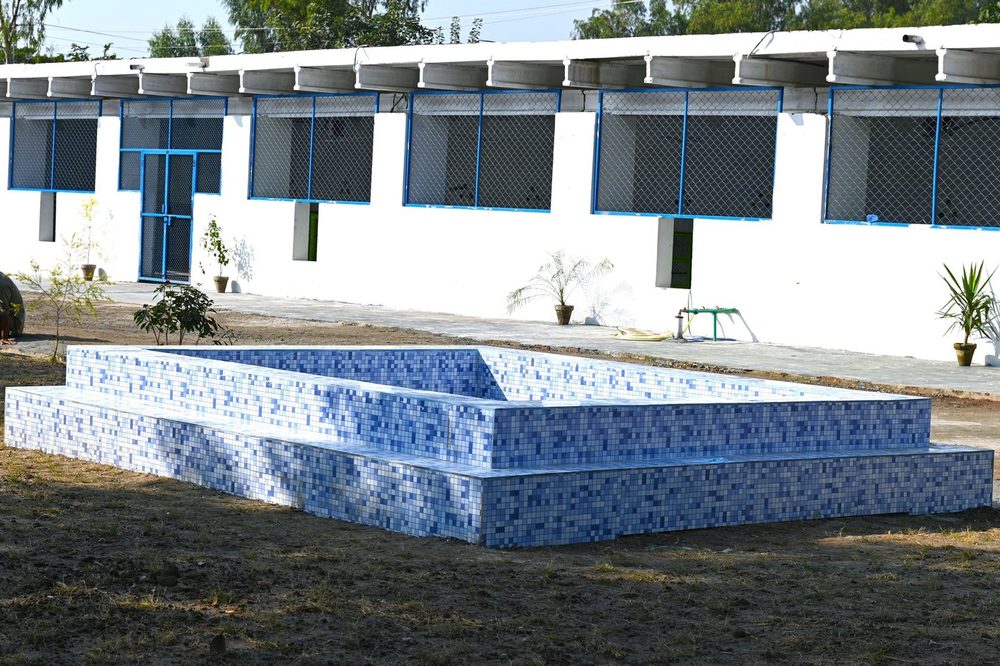 The water tank and kennel block at the Benji animal shelter