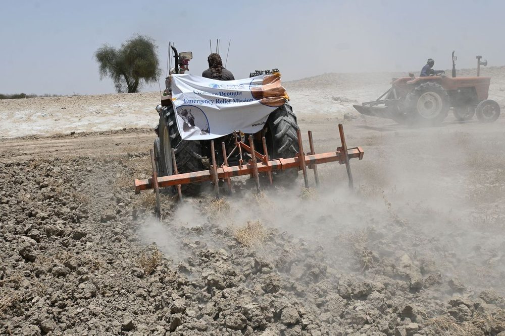 A CDRS vehicle crossing drought-cracked ground to reach a remote village