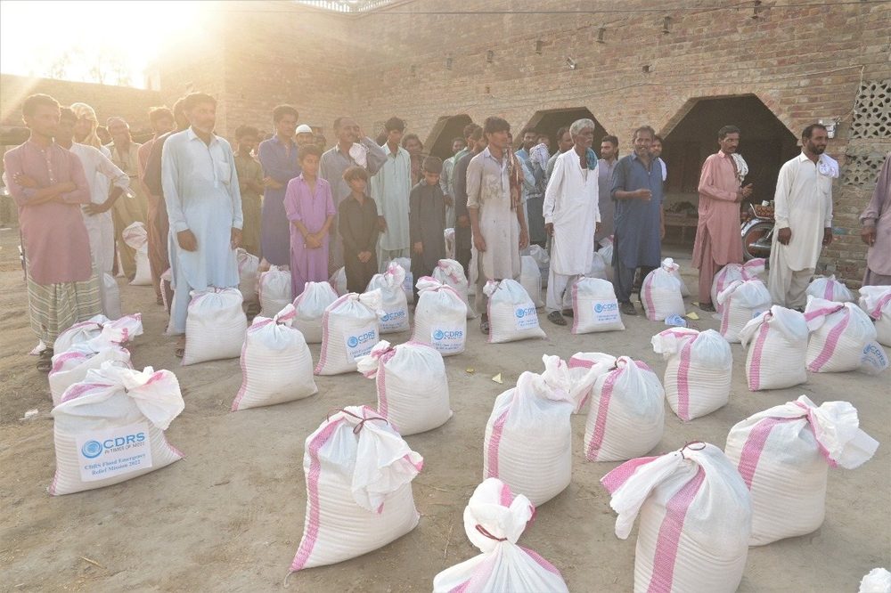 Ration bags laid out ready for a CDRS flood distribution