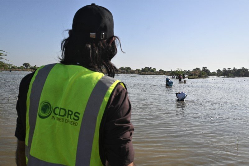 A CDRS team member in the flood zone