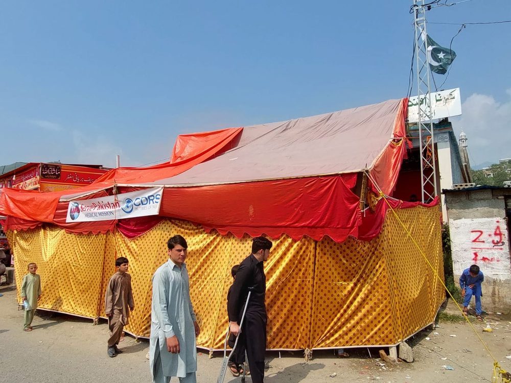 Patients being seen at a CDRS medical camp