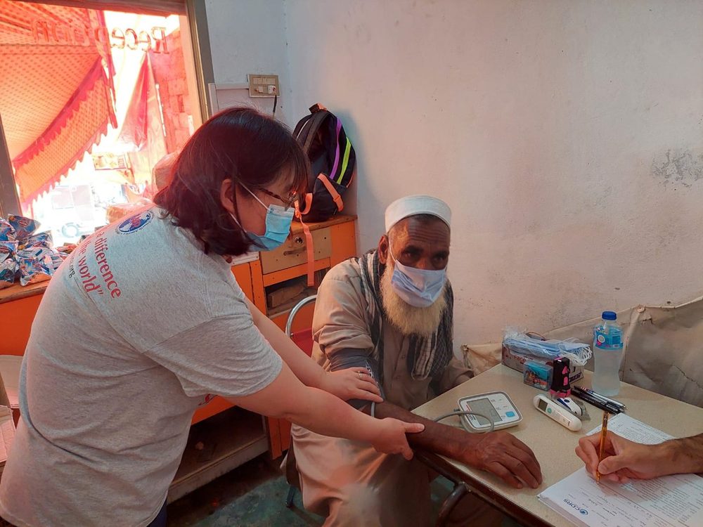 A patient having their blood pressure taken at a CDRS camp