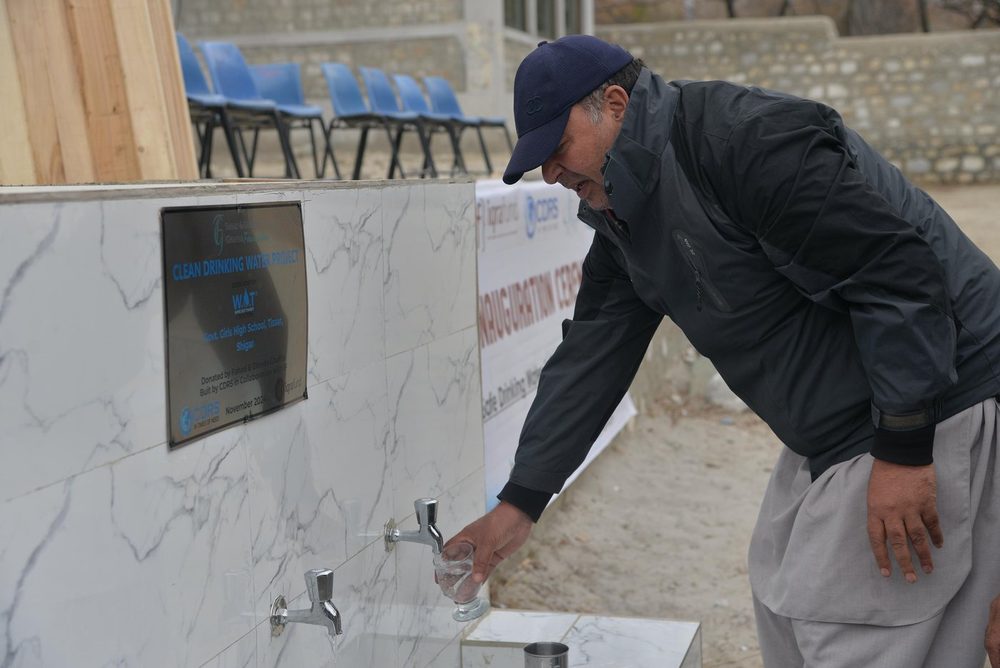 Drinking clean water at a Wipe Out Thirst project